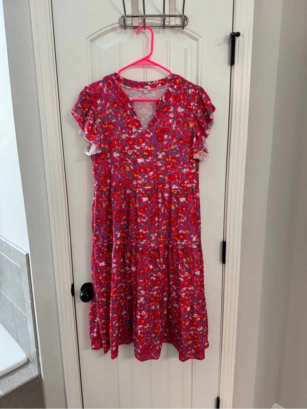 Woman’s Pink Floral Tiered Dress with Ruffle Sleeves